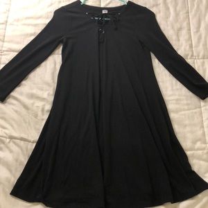 Lace up black shift dress.